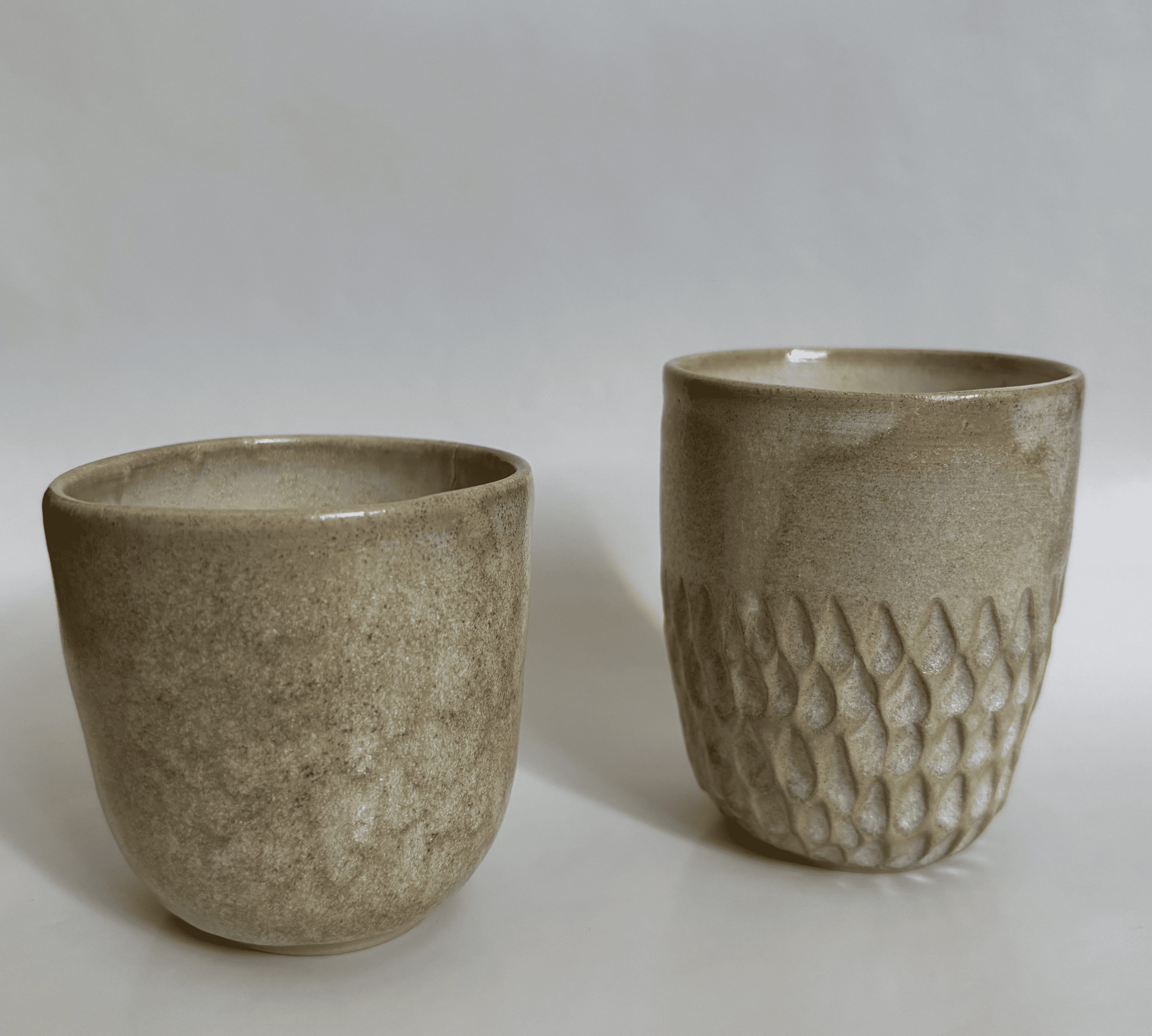 Beige ceramic cups